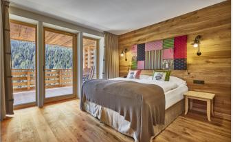 Double Room Ladinia in Tyrolean Style with Wooden Floor and Balcony