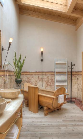 Bathroom with Wooden Bath Tub and Two Sinks