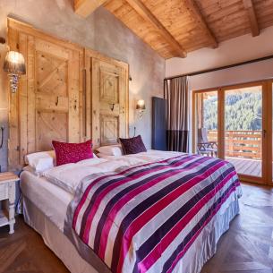 Schlafzimmer mit Terrasse - Suite Dolomites Mountain Spa