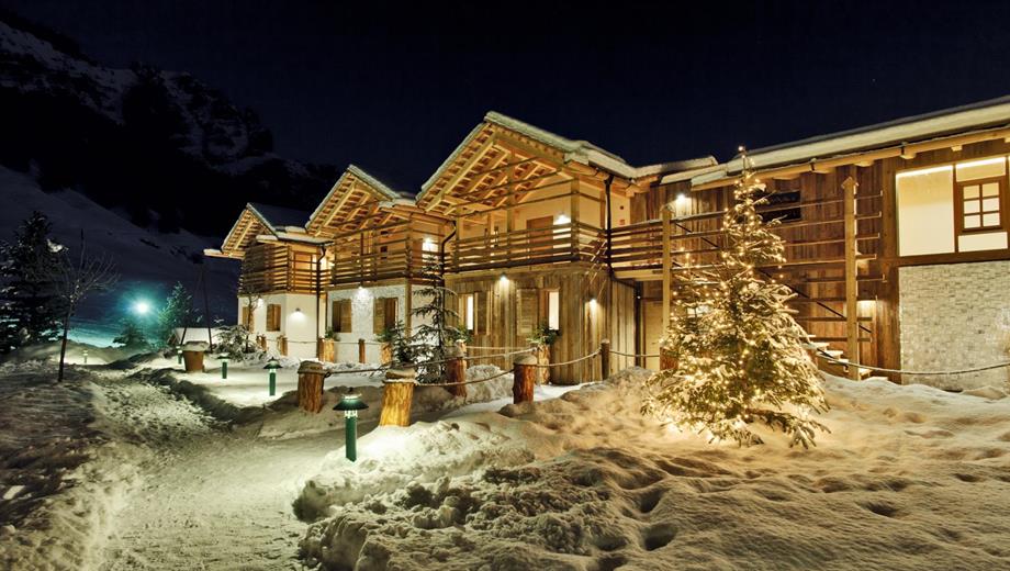 The Fanes Chalets seen from outside on a winter night